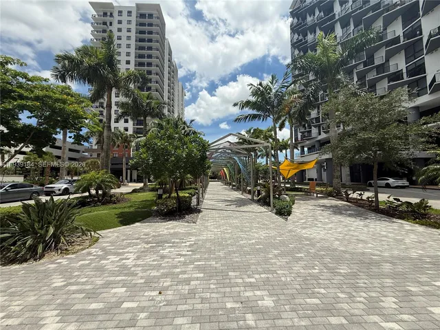 a view of a room with a large window