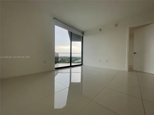 a view of building with yard