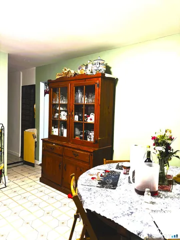a view of a dining room with furniture