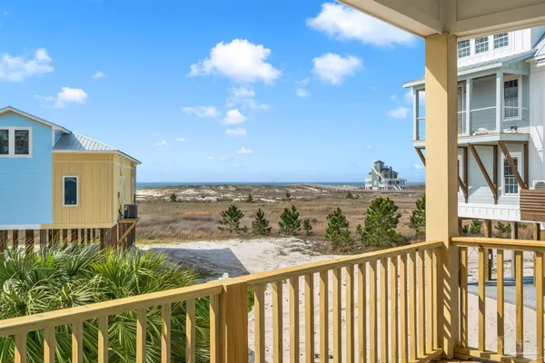 a view of a balcony with city view