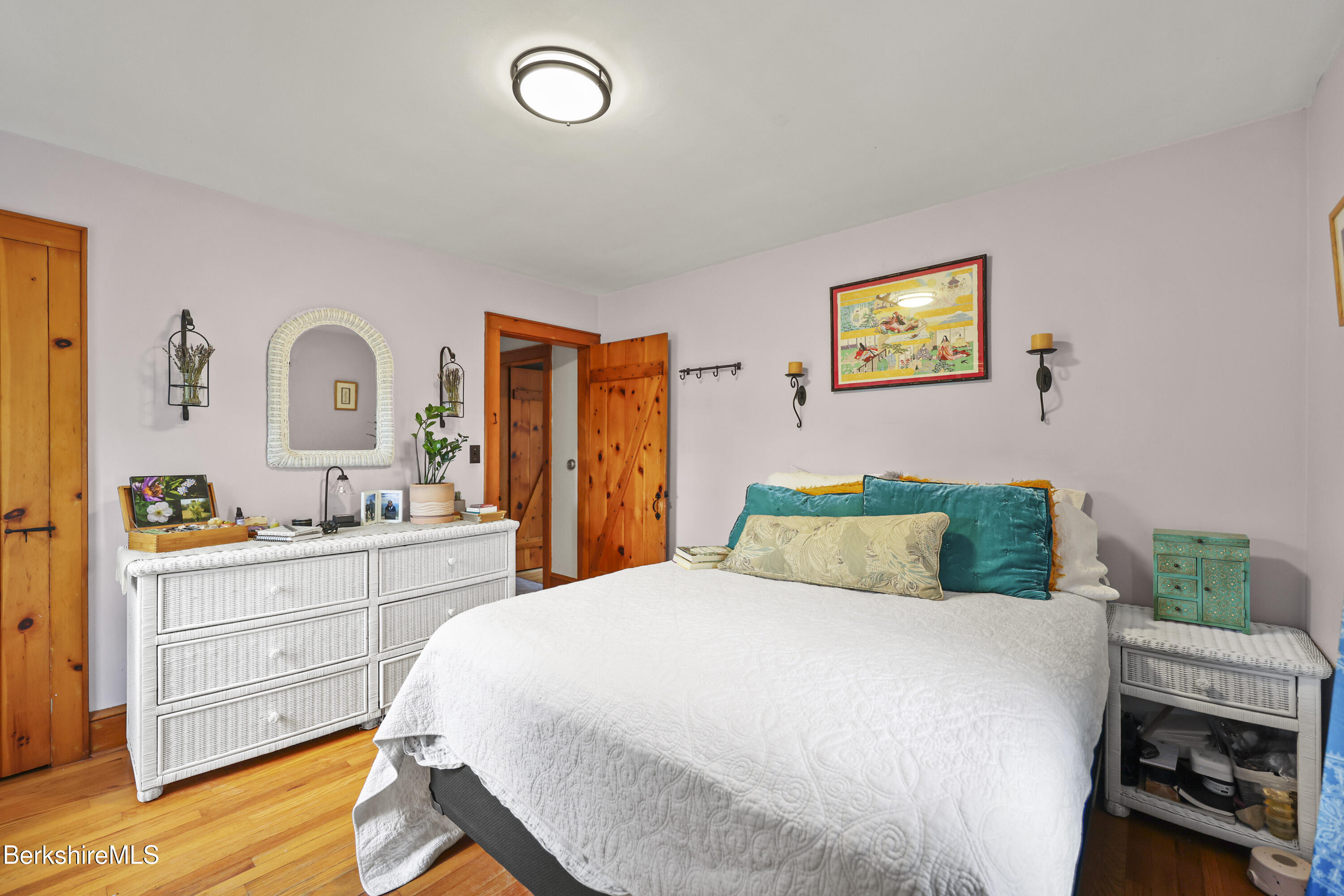 39 Lowden Street Pittsfield, MA 01201 - Photo 19 of 42 a bedroom with a bed and a dresser