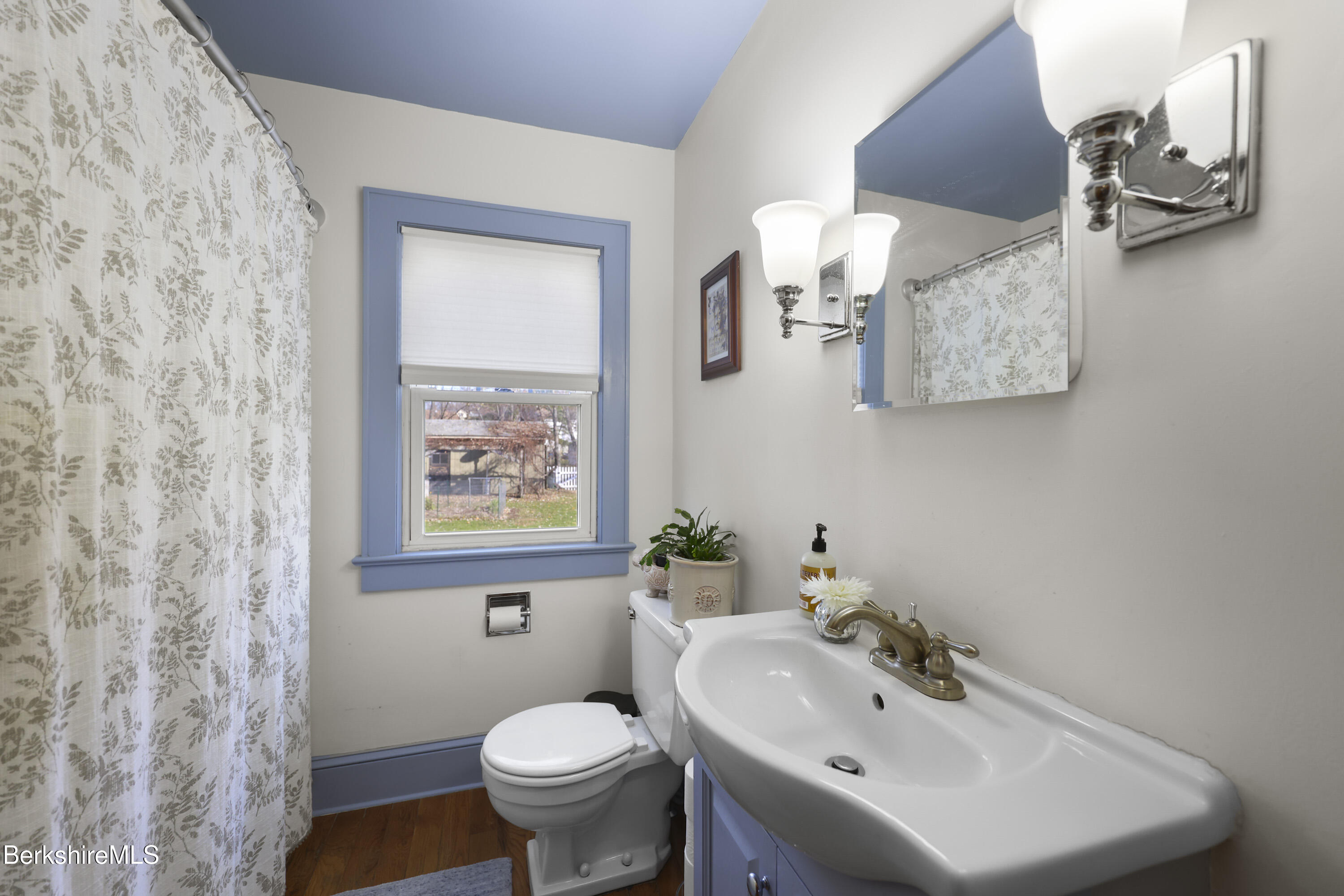 39 Lowden Street Pittsfield, MA 01201 - Photo 23 of 42 a bathroom with a sink mirror and toilet