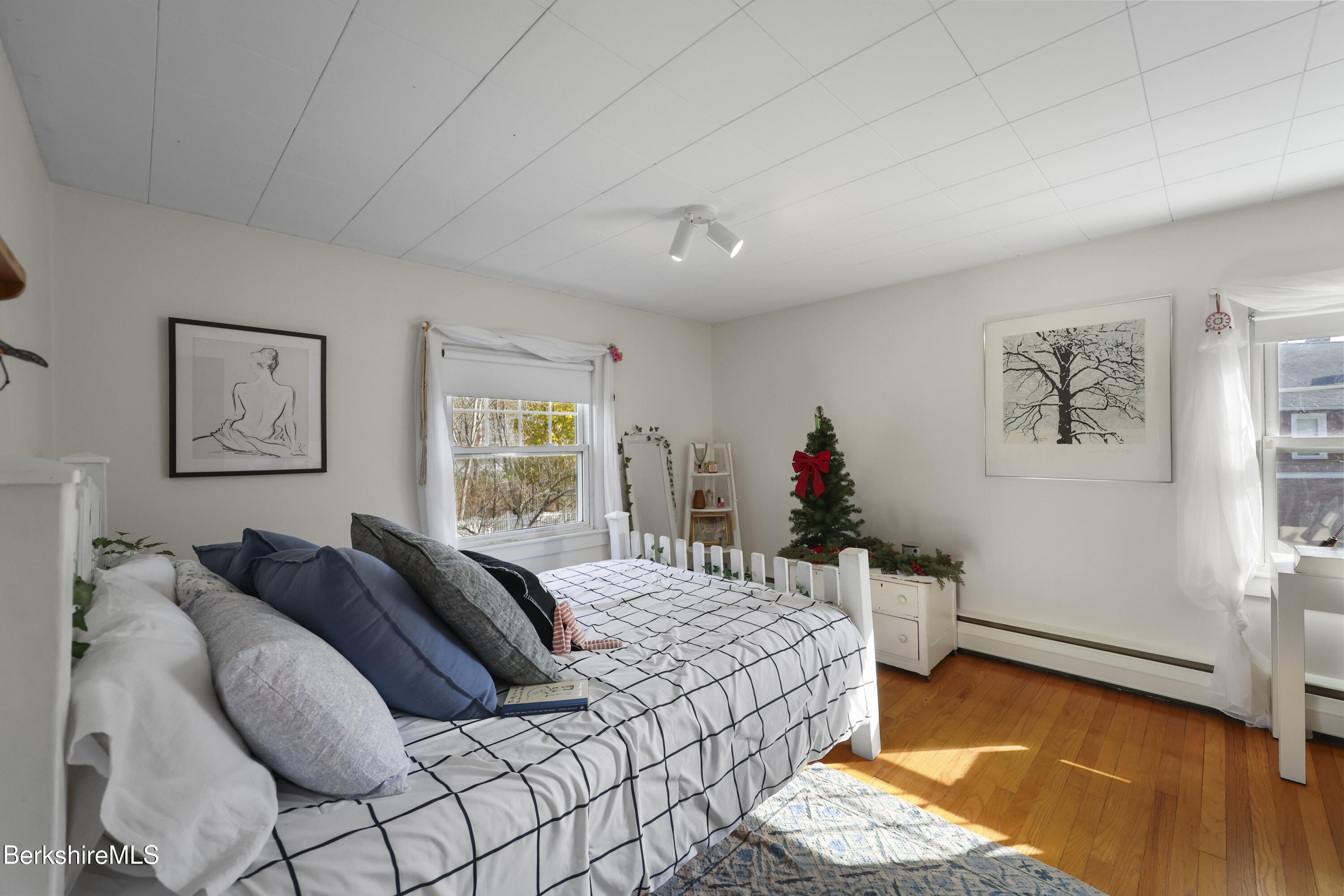 39 Lowden Street Pittsfield, MA 01201 - Photo 26 of 42 a bed room with a bed and a couch