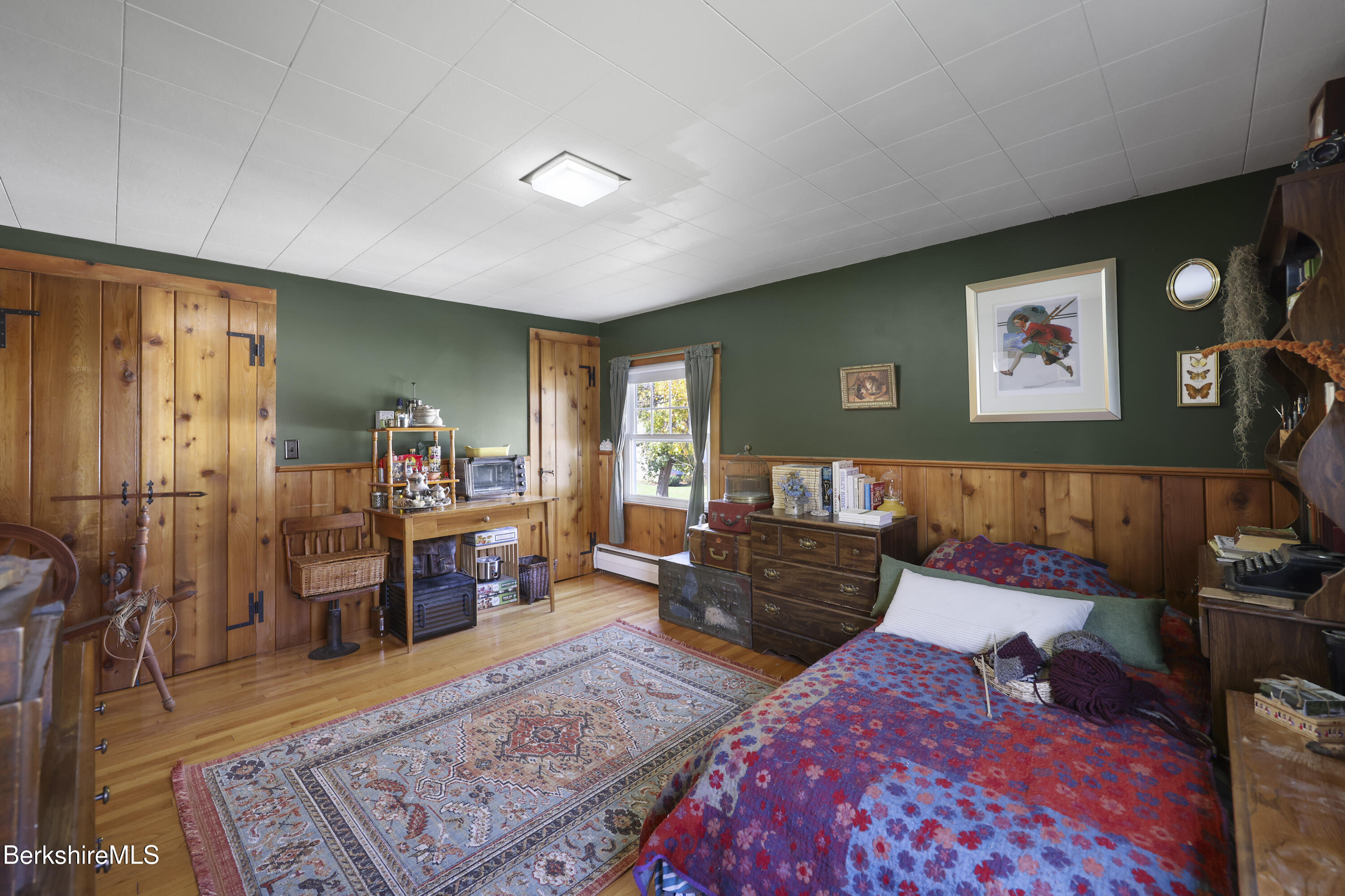 39 Lowden Street Pittsfield, MA 01201 - Photo 32 of 42 a living room with furniture and a rug