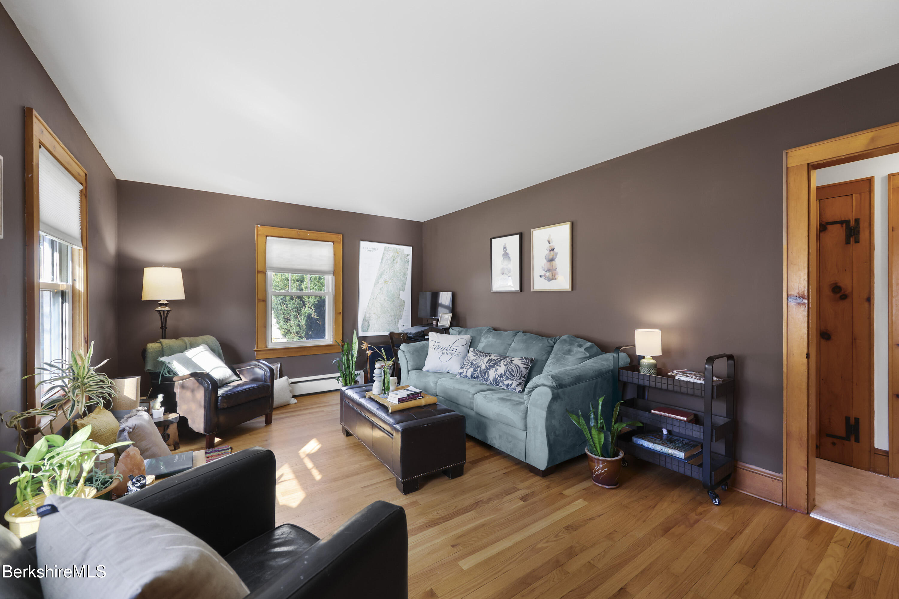39 Lowden Street Pittsfield, MA 01201 - Photo 5 of 42 a living room with furniture and a wooden floor