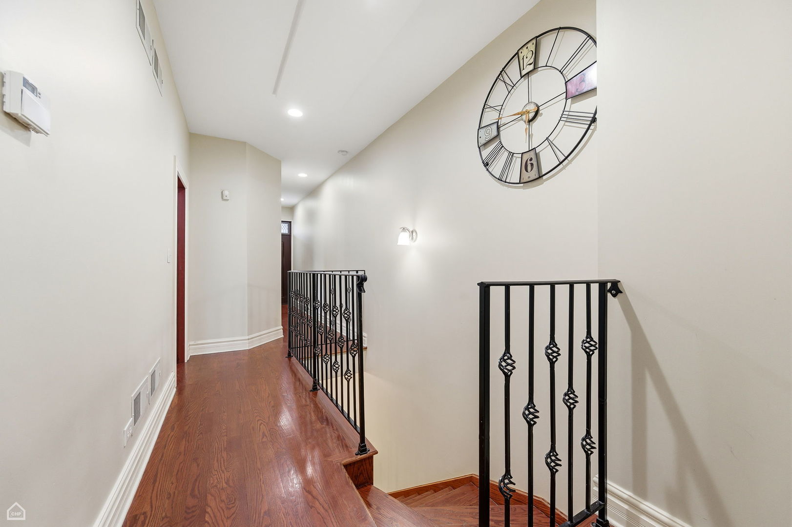 838 East 52nd Street, Unit 1W Chicago, IL 60615 - Photo 15 of 32 a view of a hallway with wooden floor