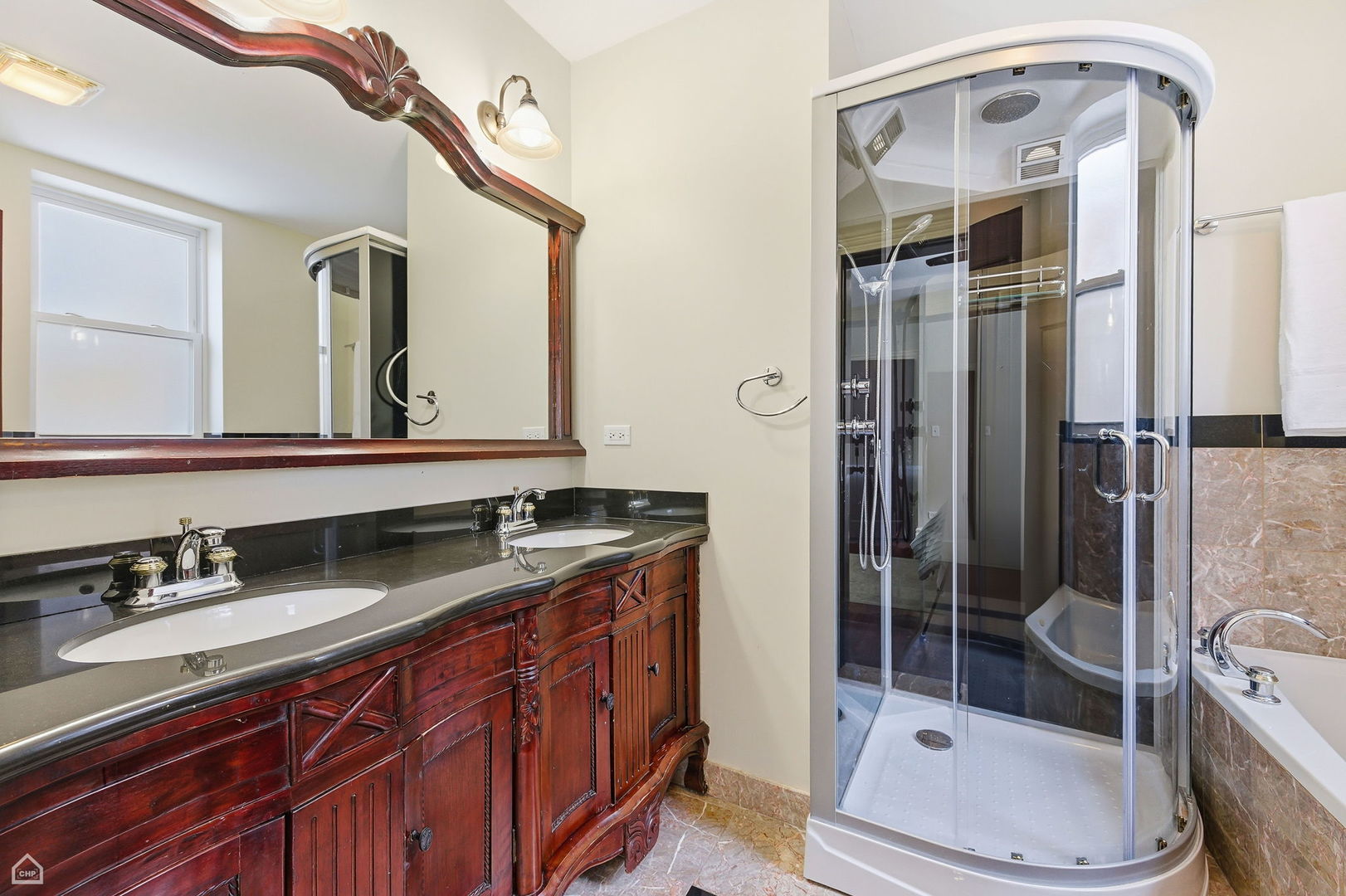 838 East 52nd Street, Unit 1W Chicago, IL 60615 - Photo 18 of 32 a bathroom with a sink a toilet and shower