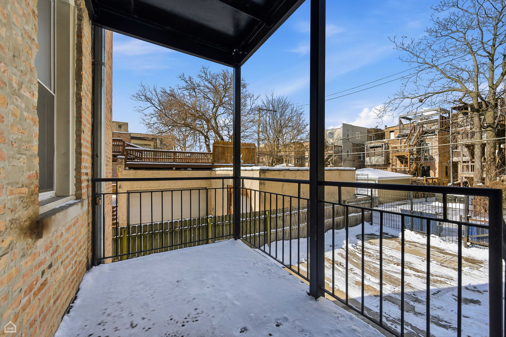 838 East 52nd Street, Unit 1W Chicago, IL 60615 - Photo 30 of 32 a view of city from a balcony