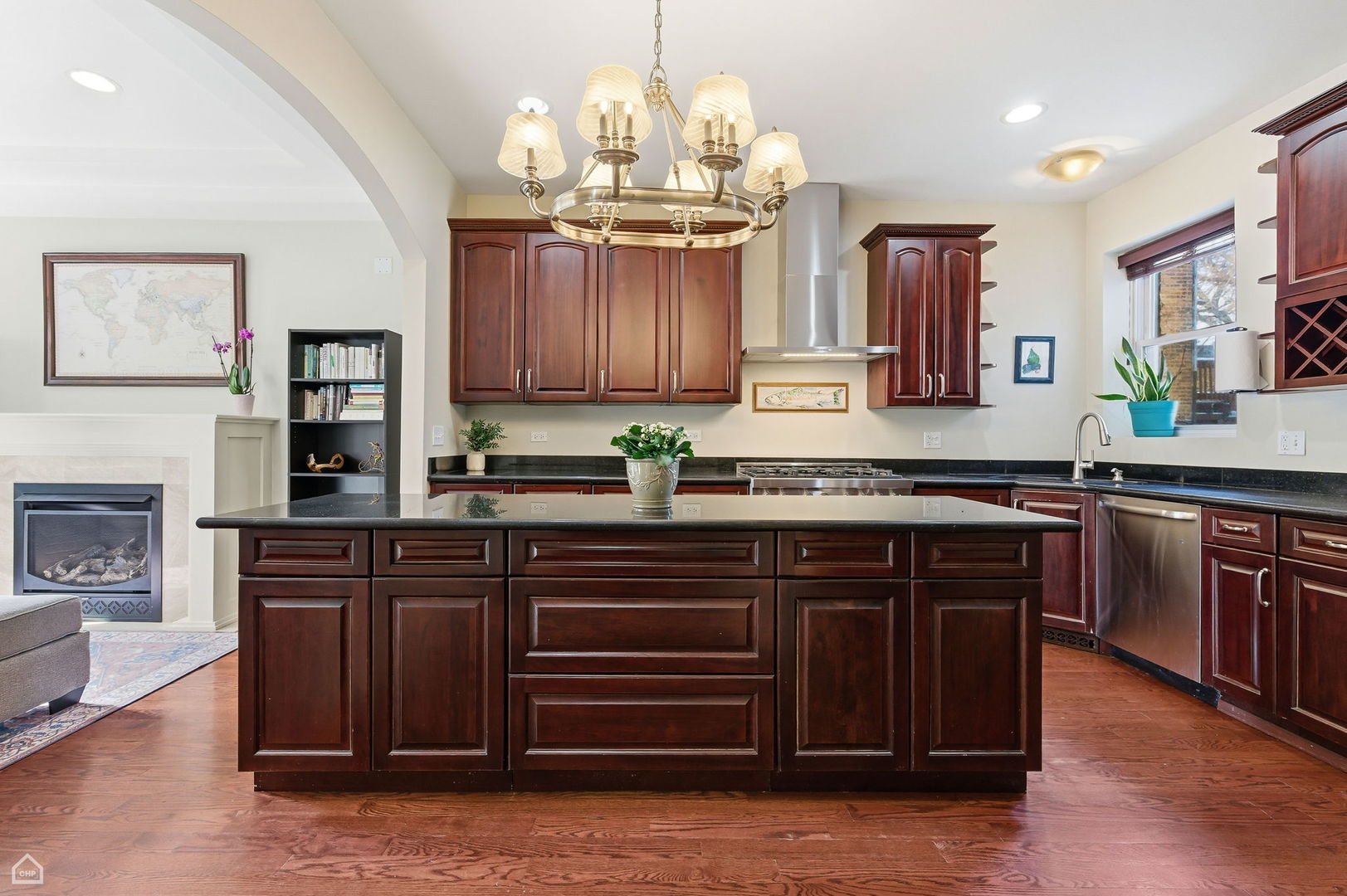 838 East 52nd Street, Unit 1W Chicago, IL 60615 - Photo 3 of 32 a kitchen with stainless steel appliances granite countertop a stove and cabinets