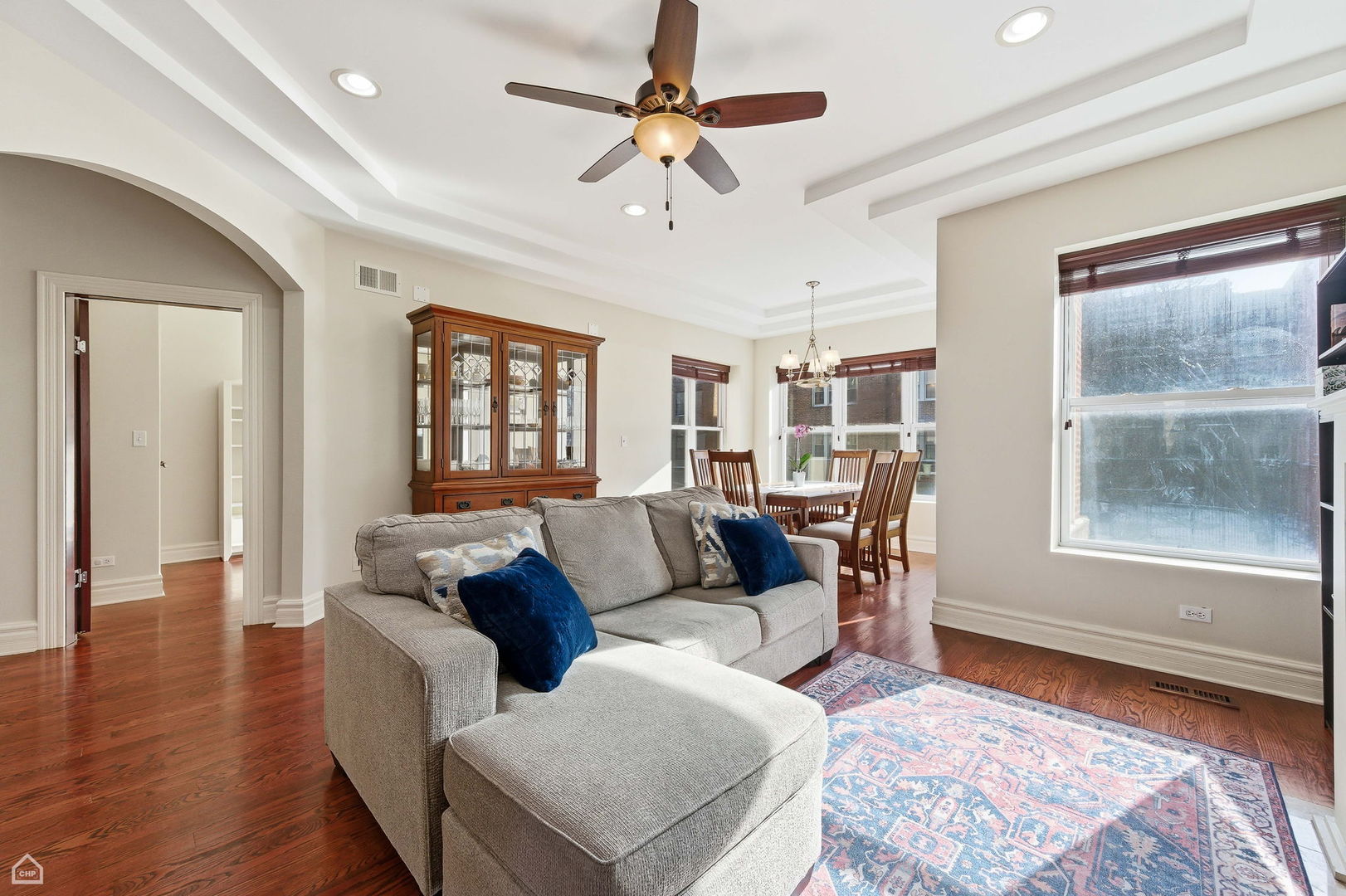838 East 52nd Street, Unit 1W Chicago, IL 60615 - Photo 10 of 32 a living room with furniture and a window