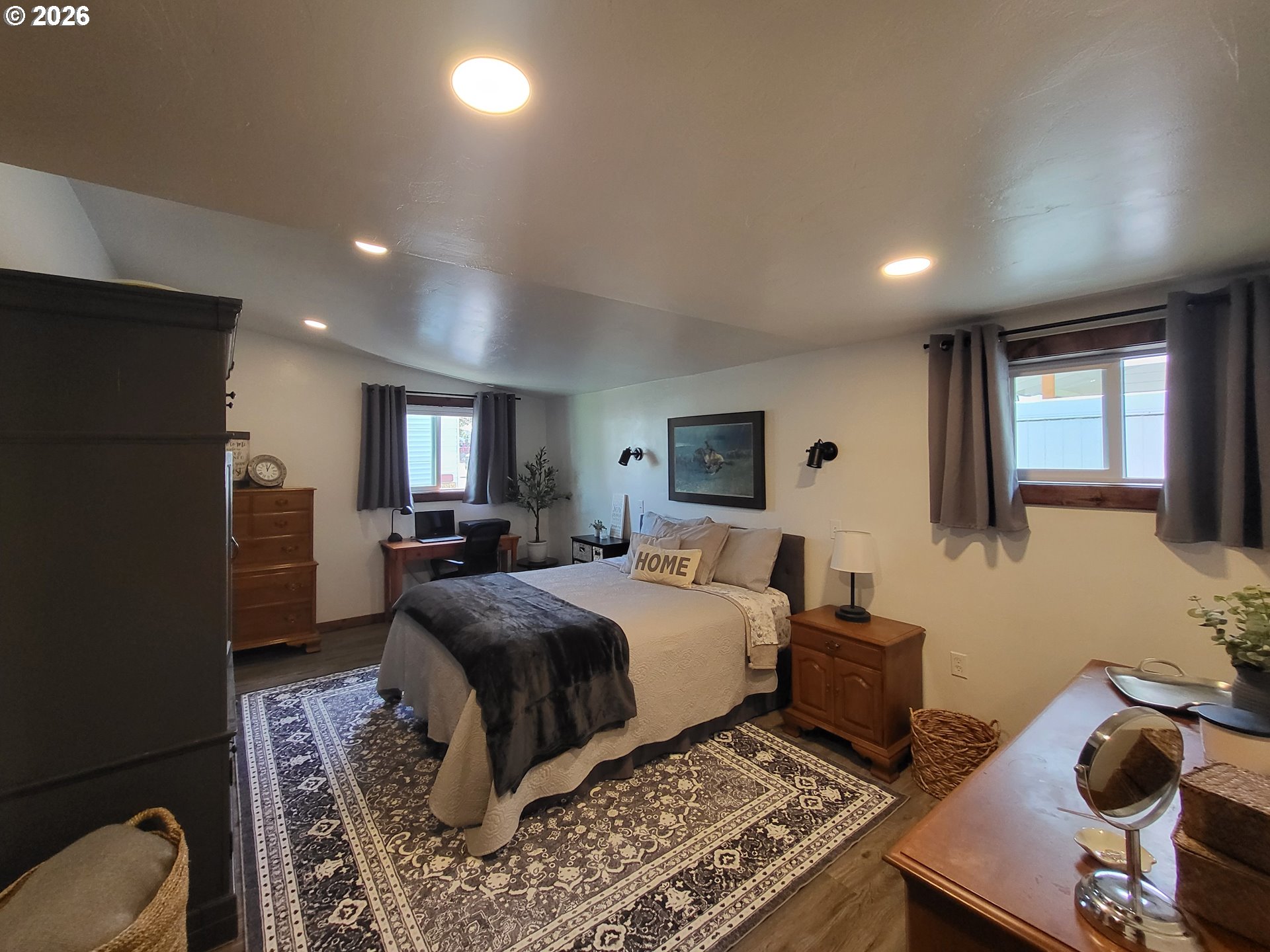 403 North Lake Street Joseph, OR 97846 - Photo 28 of 46 a bed room with a bed furniture and a window