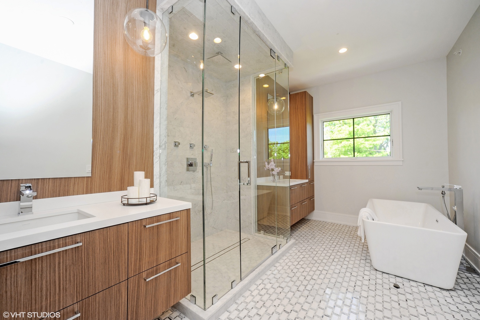 2440 Illinois Road Northbrook, IL 60062 - Photo 12 of 18 a bathroom with a double vanity sink mirror and bathtub
