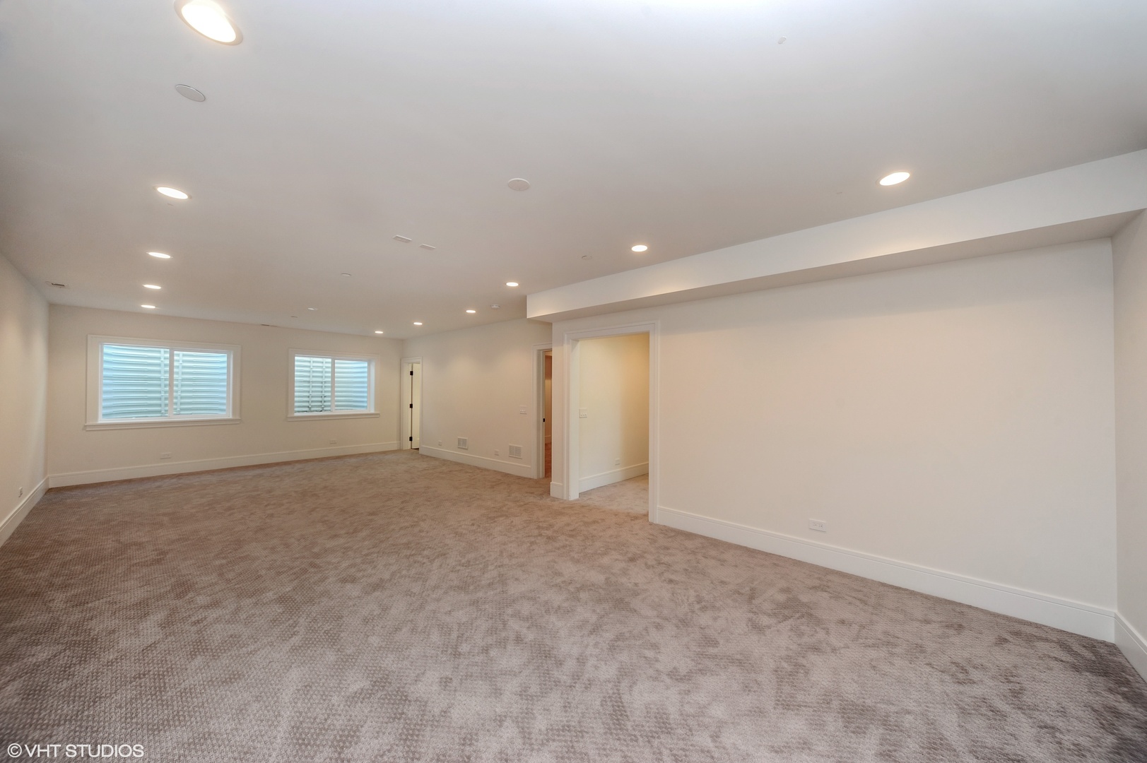 2440 Illinois Road Northbrook, IL 60062 - Photo 17 of 18 an empty room with windows and pillars in it
