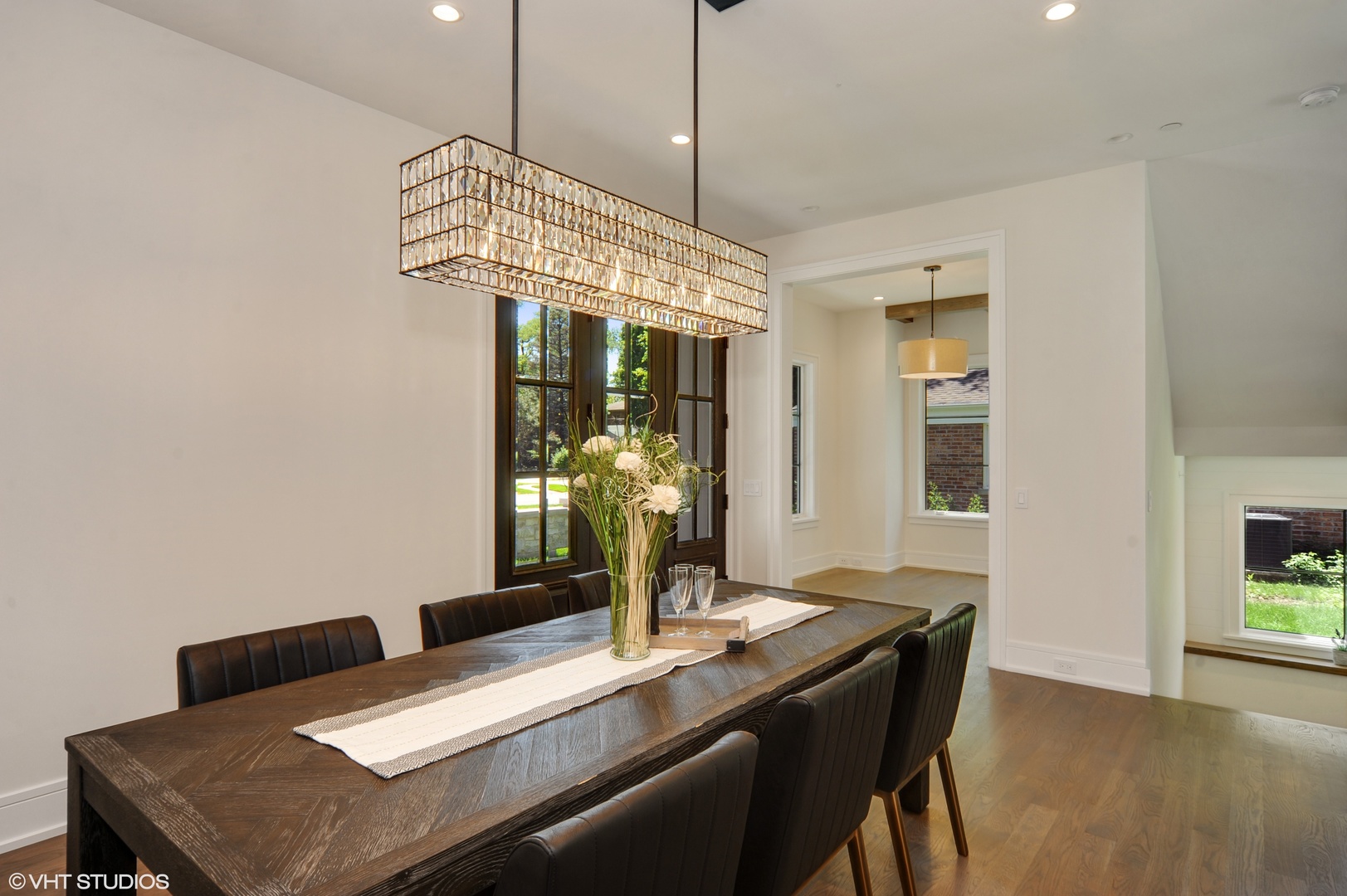 2440 Illinois Road Northbrook, IL 60062 - Photo 3 of 18 a view of a dining room with a table and chairs