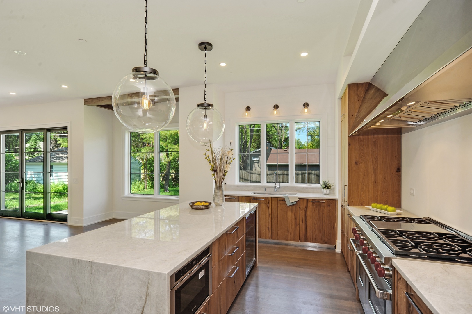 2440 Illinois Road Northbrook, IL 60062 - Photo 4 of 18 a kitchen that has a lot of cabinets in it