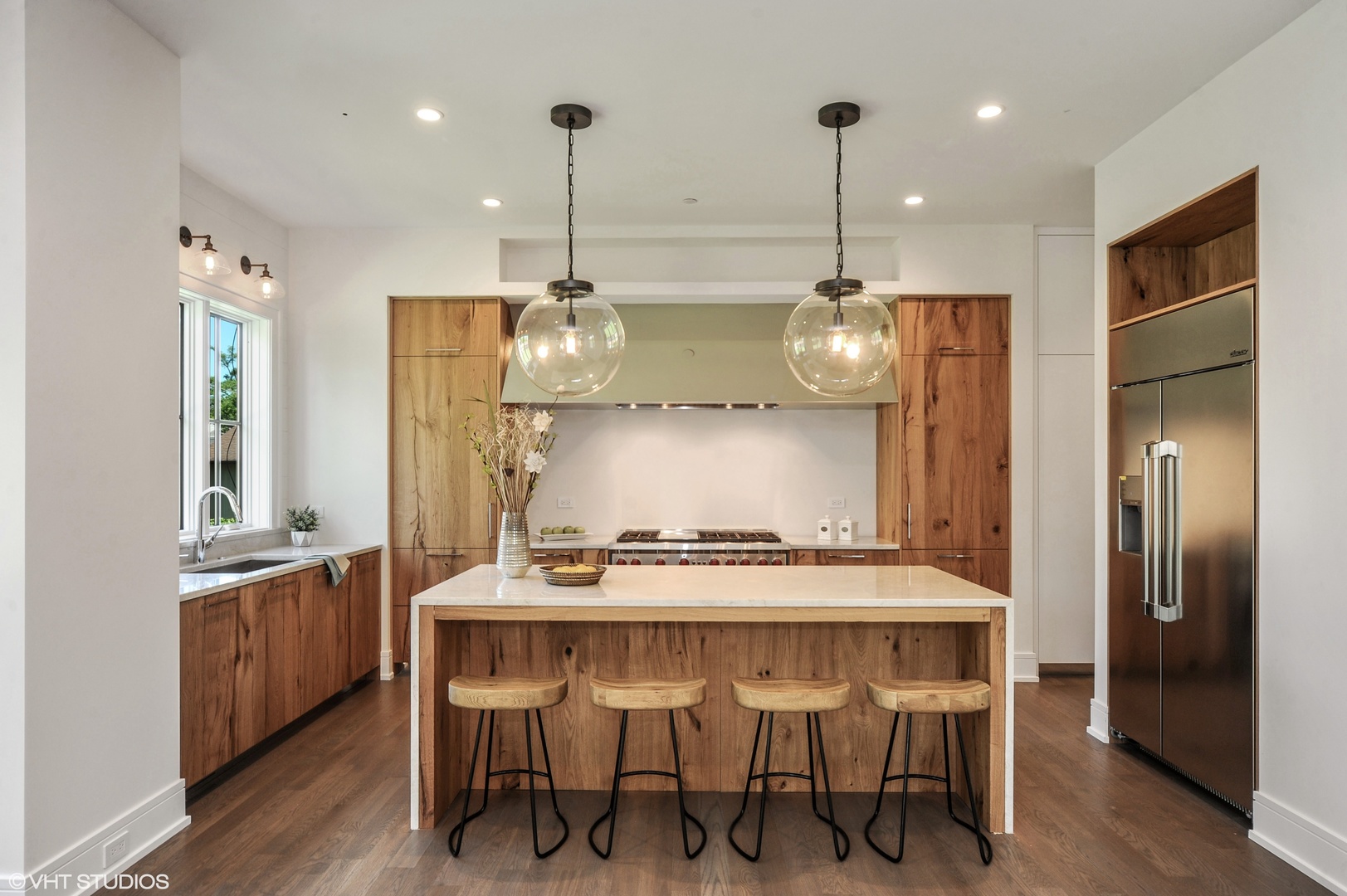 2440 Illinois Road Northbrook, IL 60062 - Photo 5 of 18 a kitchen with a table and chairs in it