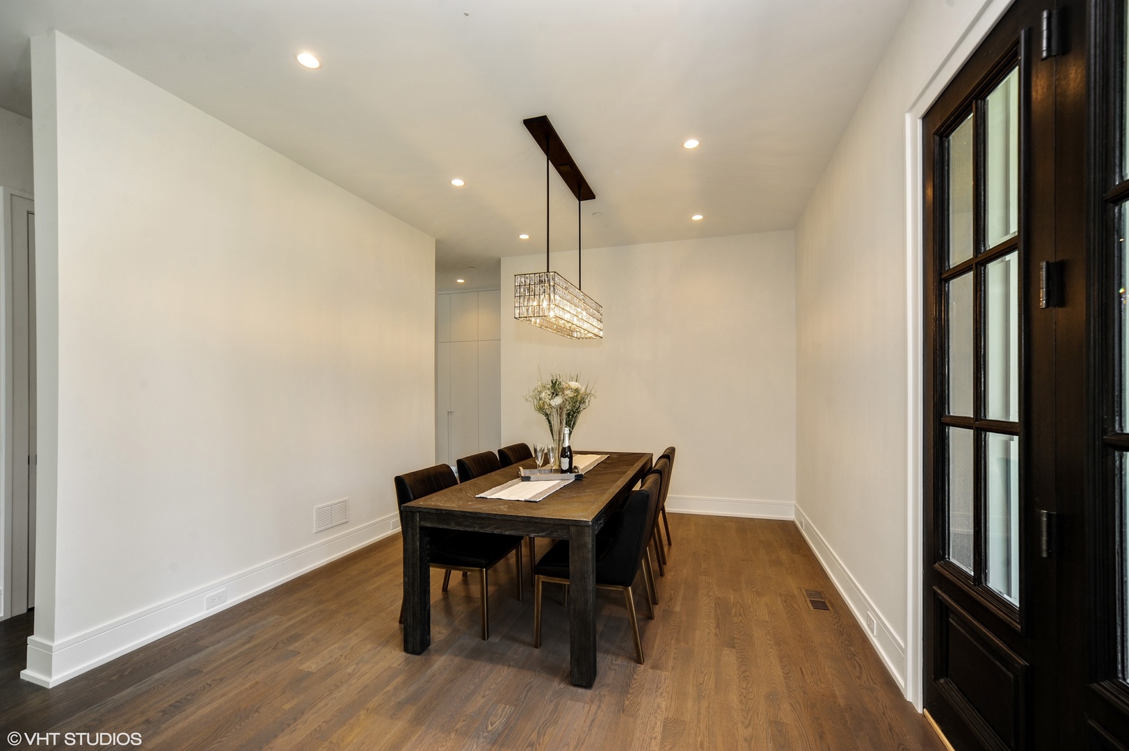 2440 Illinois Road Northbrook, IL 60062 - Photo 6 of 18 a room with furniture and wooden floor