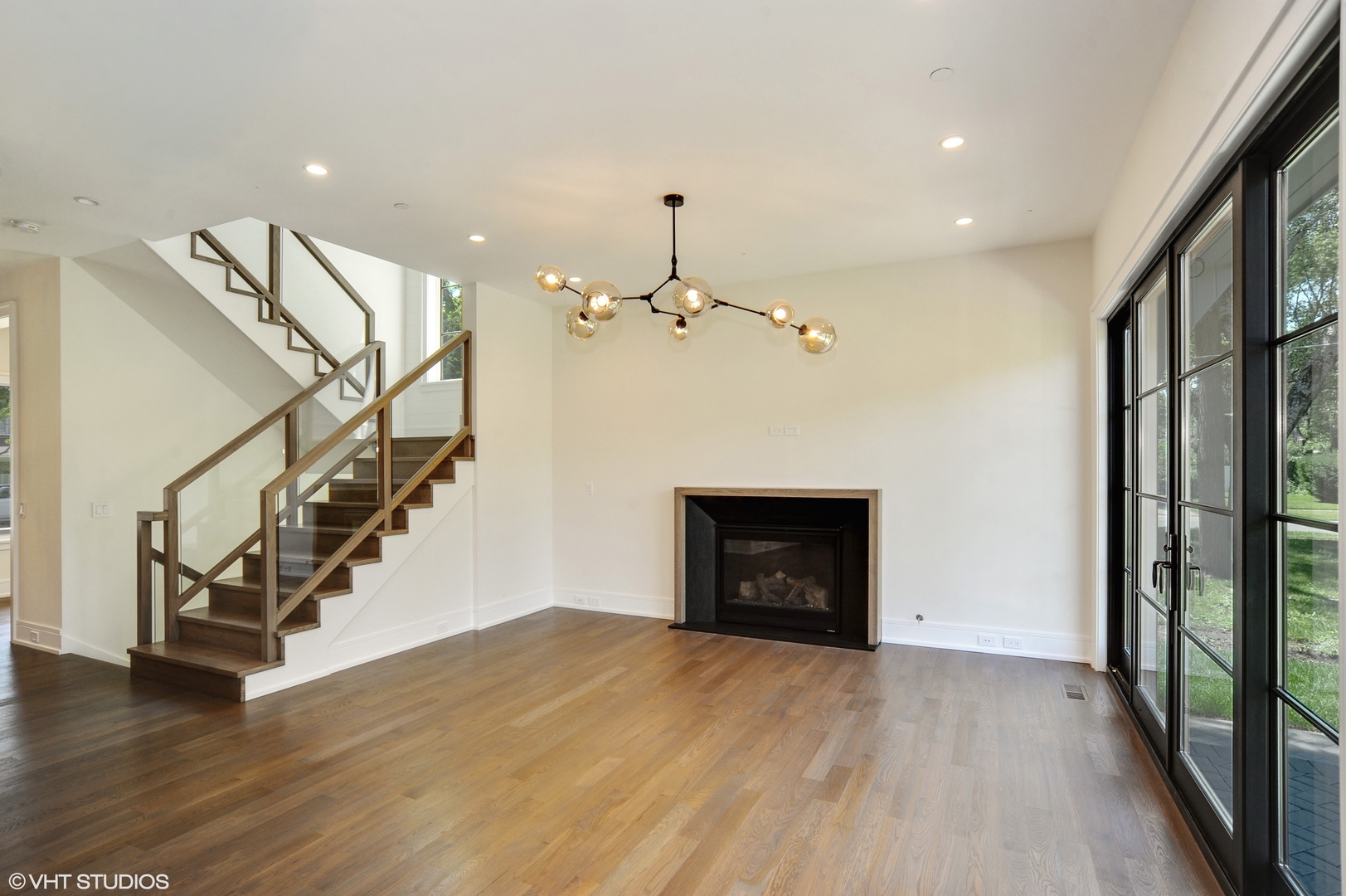 2440 Illinois Road Northbrook, IL 60062 - Photo 7 of 18 a view of entryway and hall with wooden floor