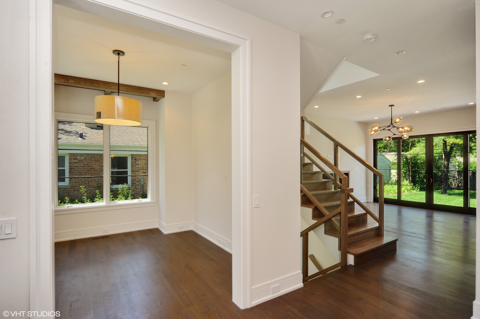2440 Illinois Road Northbrook, IL 60062 - Photo 9 of 18 a view of an entryway with wooden floor and windows