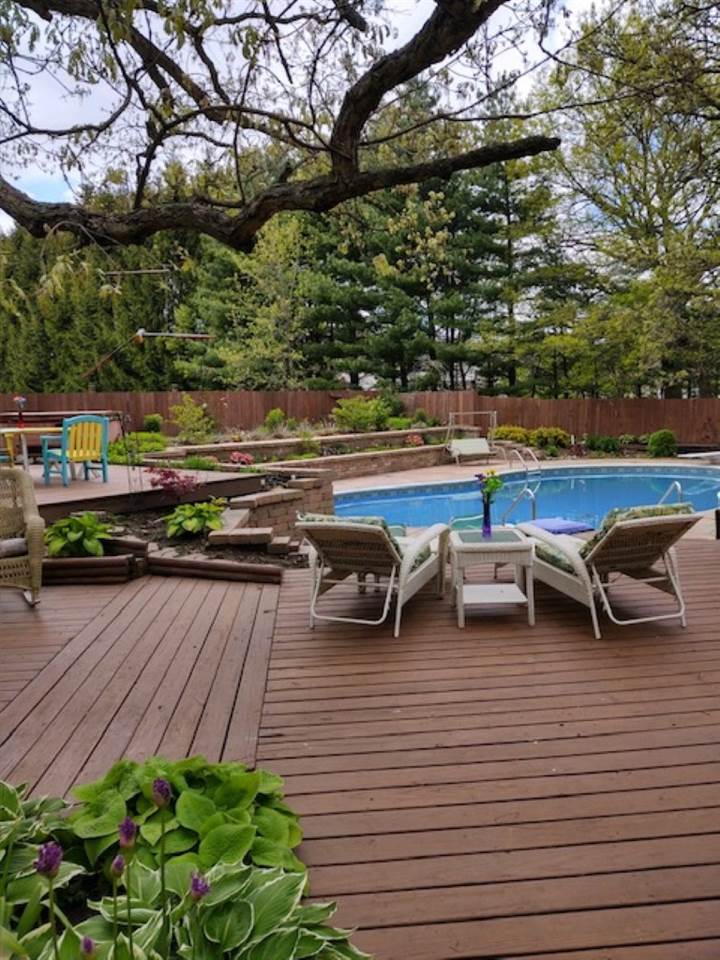 11900 Beloit Road Caledonia, IL 61011 - Photo 6 of 27 a view of a terrace with sitting area