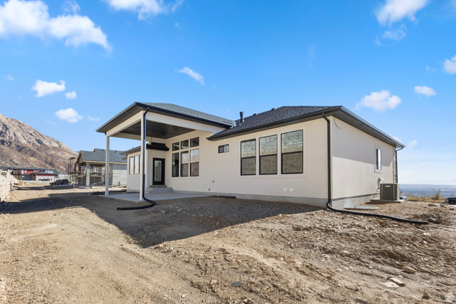 710 East Mountain Road North Ogden, UT 84414 - Photo 36 of 36 Back of house featuring a patio and a mountain view