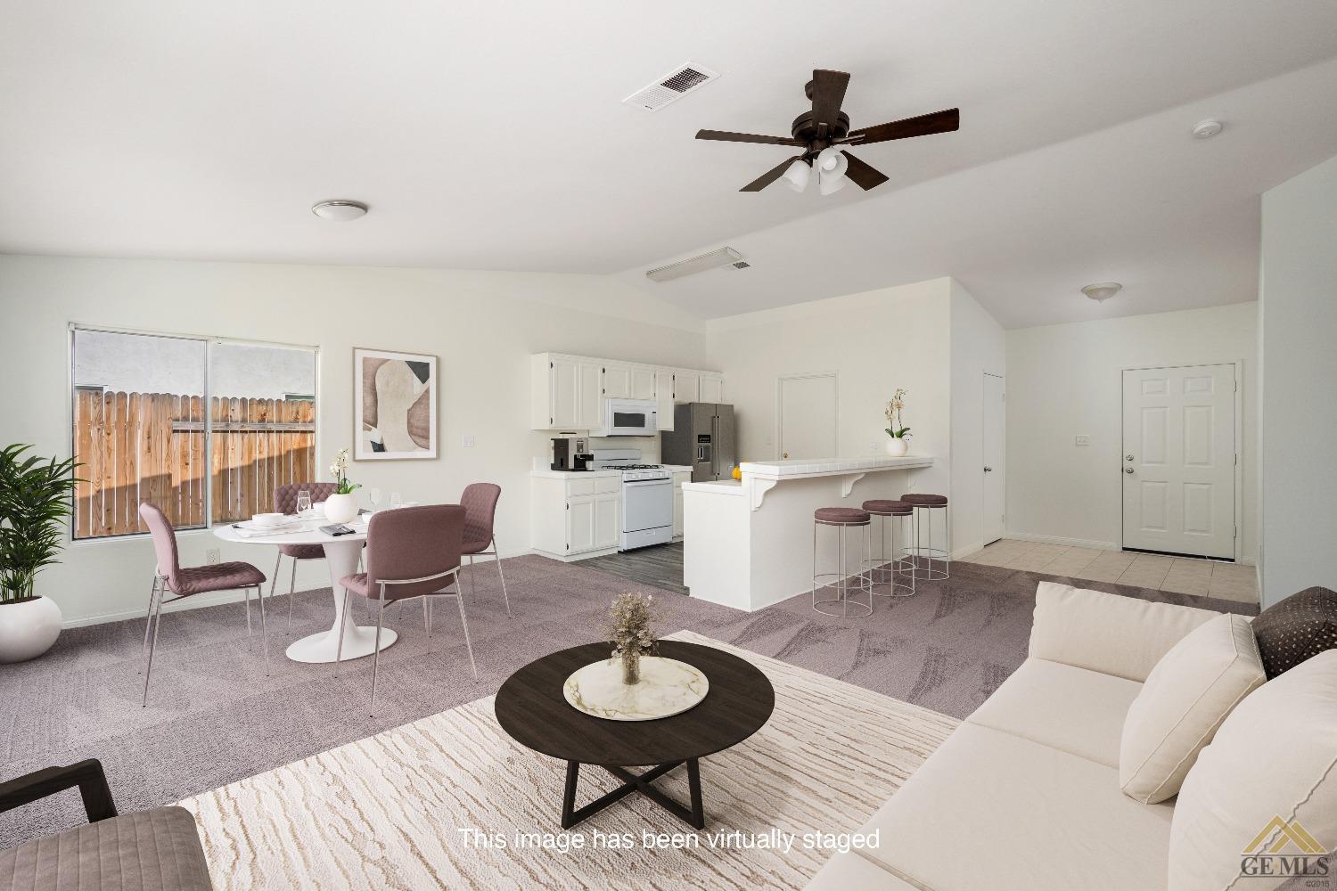 Undisclosed Address Bakersfield, CA 93308 - Photo 5 of 18 a living room with furniture and a wooden floor