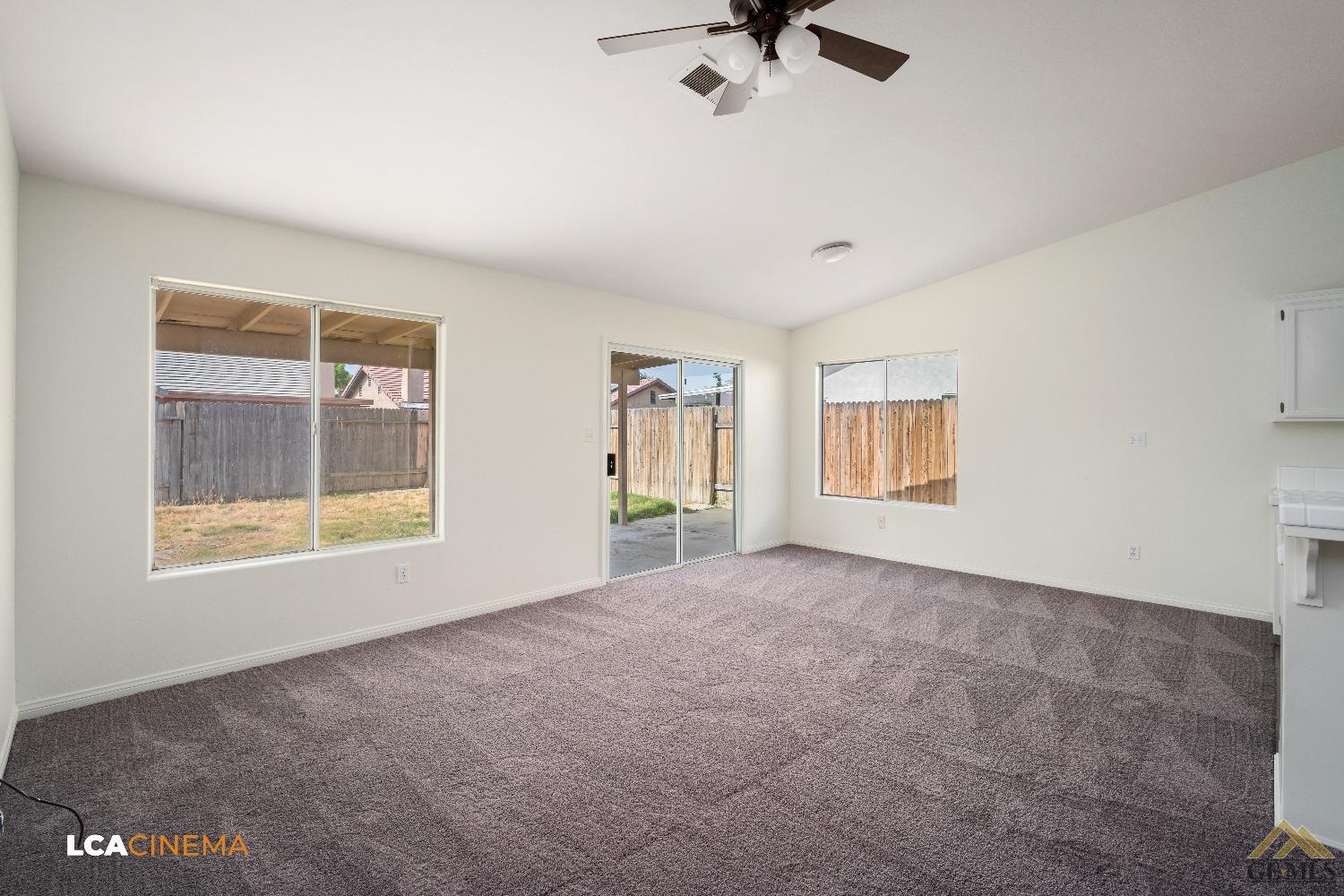 Undisclosed Address Bakersfield, CA 93308 - Photo 8 of 18 a view of an empty room with a window