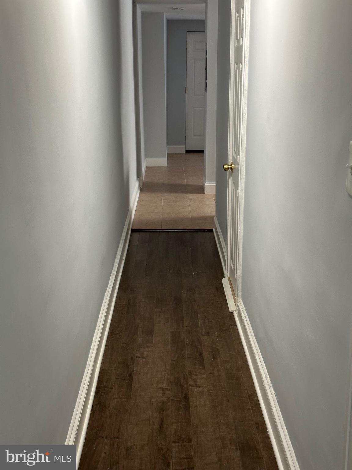 4331 Harford Road, Unit 2 Baltimore, MD 21214 - Photo 3 of 17 a view of a hallway with wooden floor