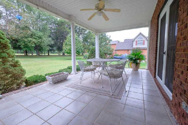 676 Pickney Road Winchester, TN 37398 - Photo 18 of 20 Enjoy outdoor living on this covered back porch with tile flooring and features a gas hookup for the grill