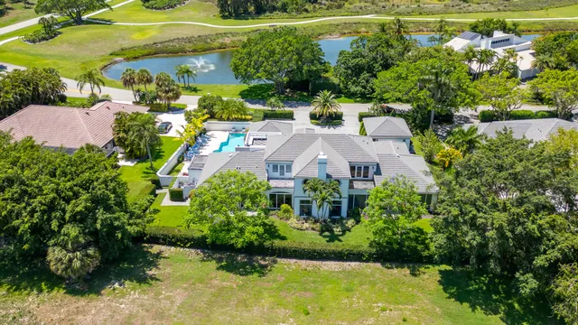 an aerial view of a house with a garden