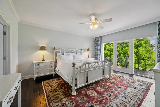 a bed room with a bed and a chandelier