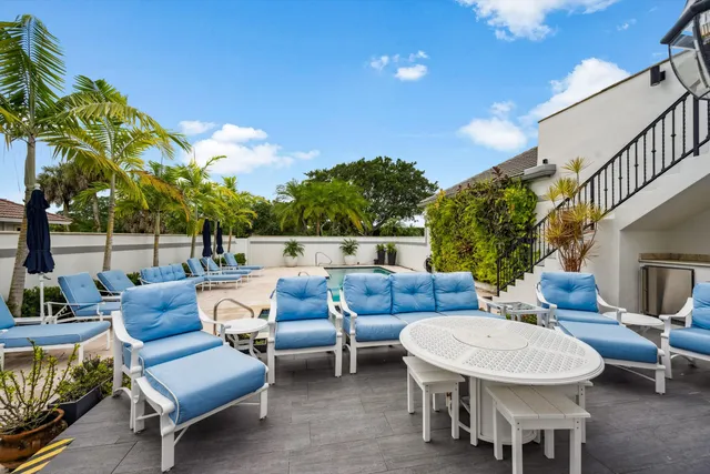 a outdoor living space with furniture and a potted plant