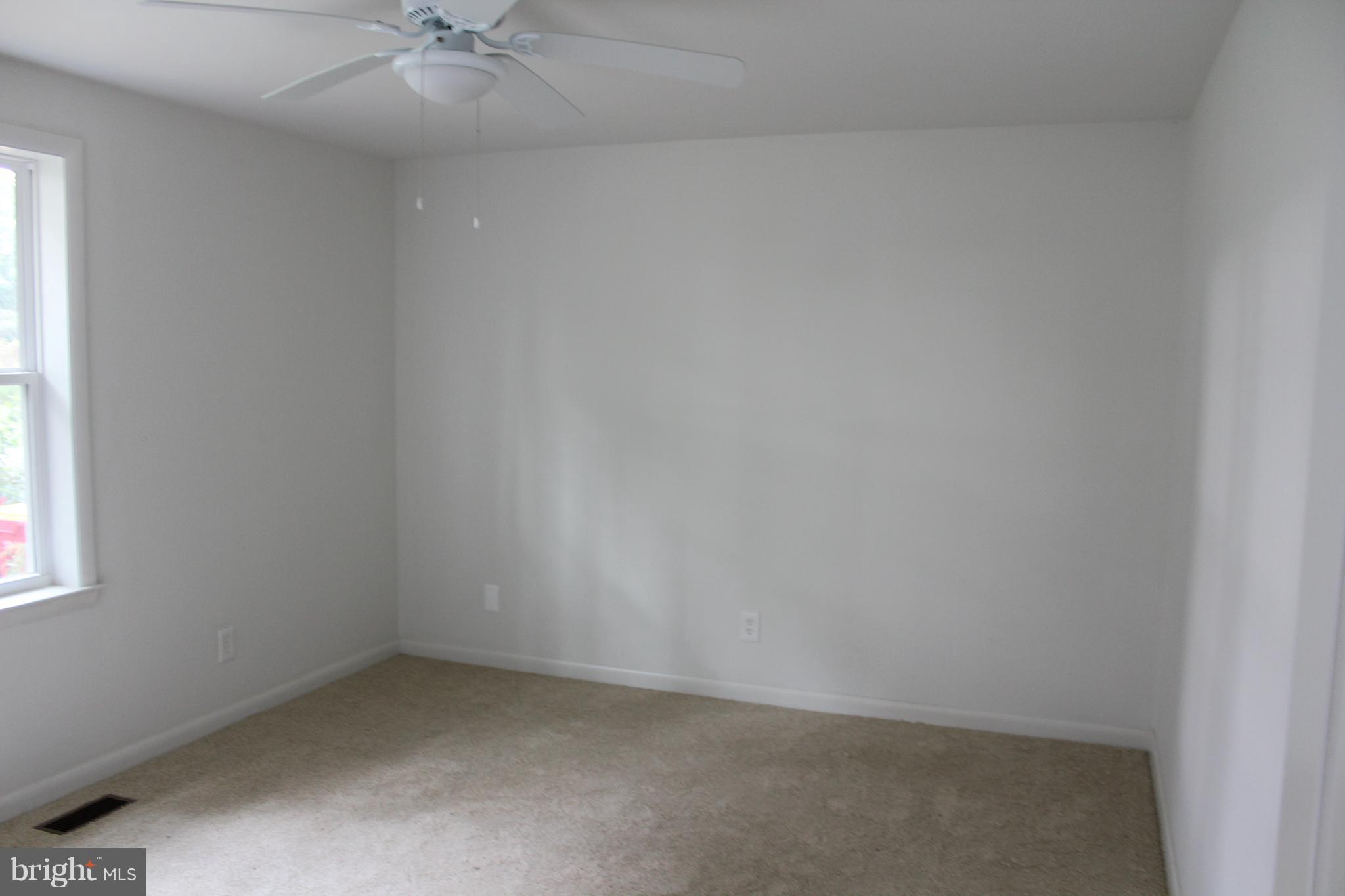 806 North Reymann Street Ranson, WV 25438 - Photo 14 of 25 an empty room with a window