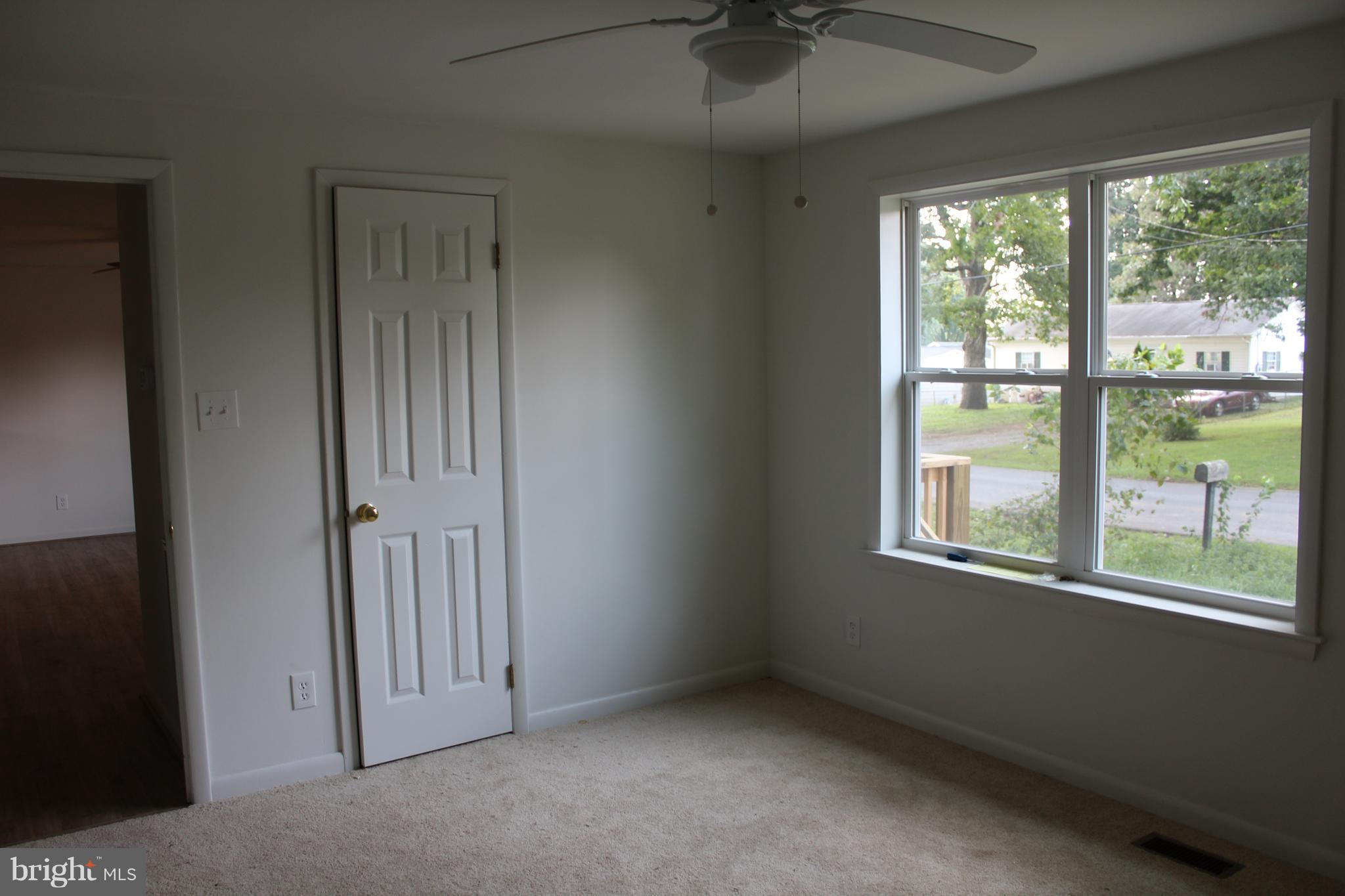 806 North Reymann Street Ranson, WV 25438 - Photo 15 of 25 an empty room with a window