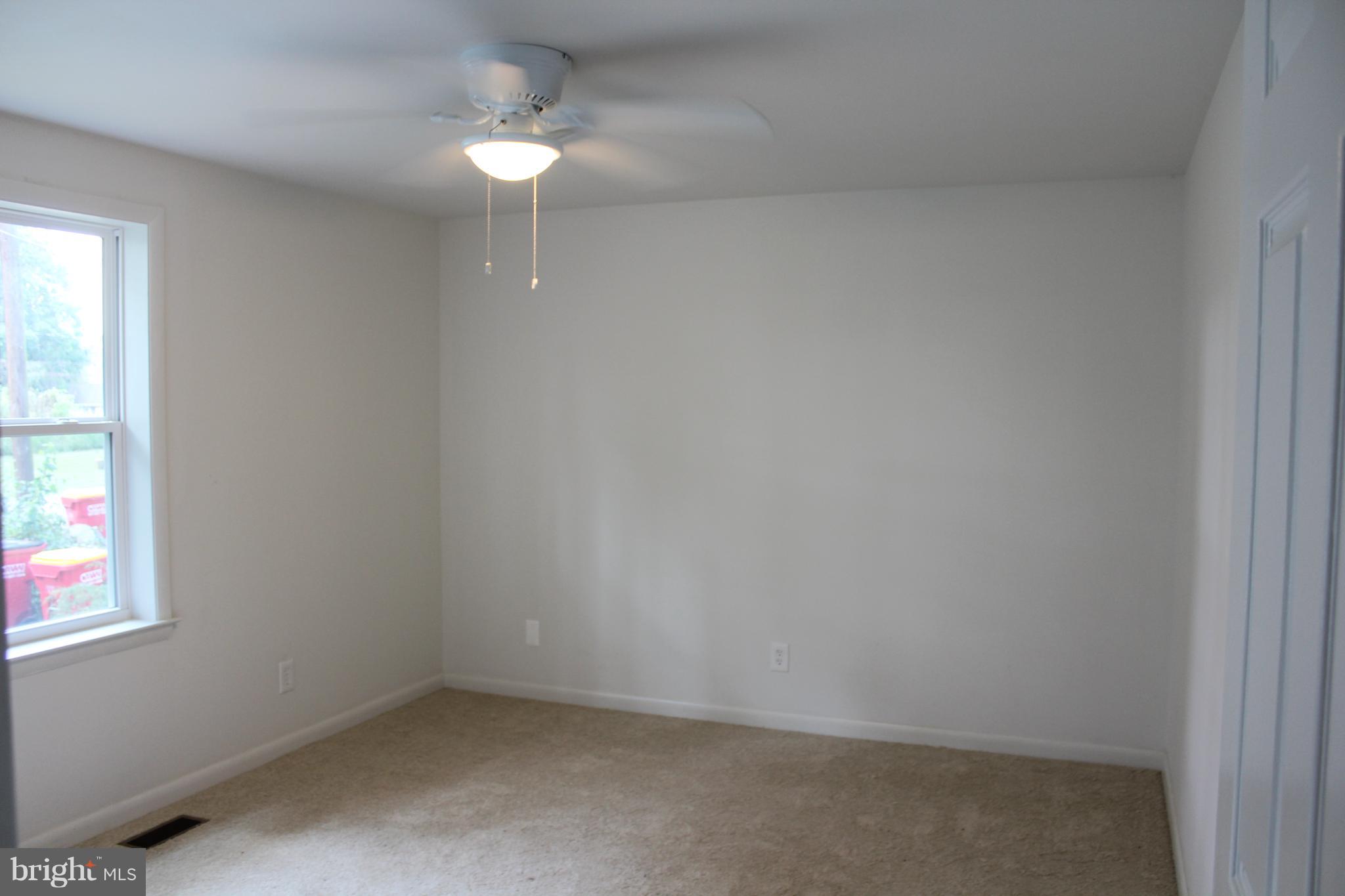 806 North Reymann Street Ranson, WV 25438 - Photo 16 of 25 an empty room with a window