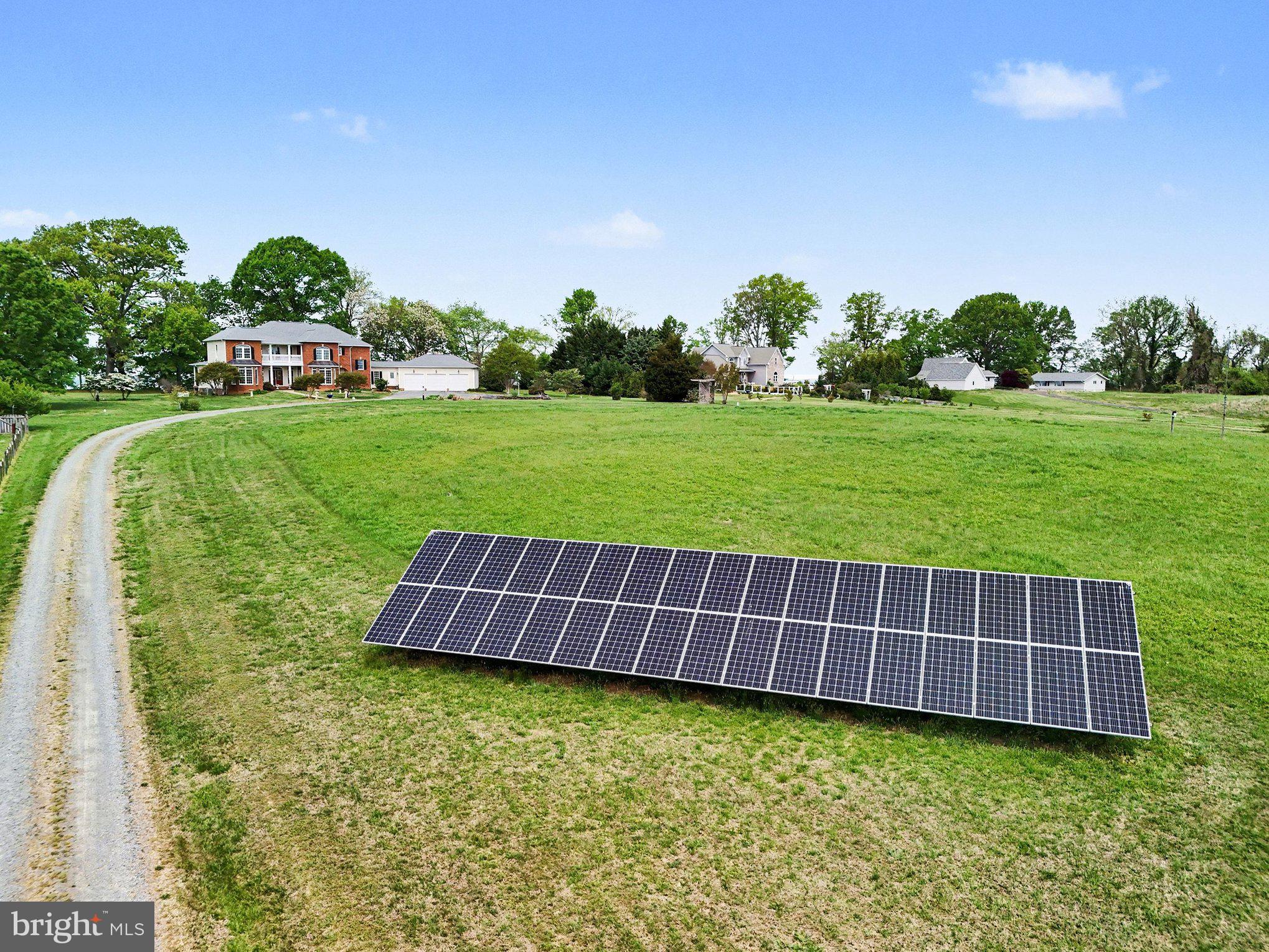 16186 Bundock Road King George, VA 22485 - Photo 75 of 82 Owned solar panels collect green power