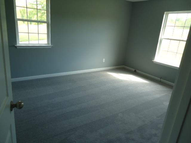 1076 Jacob's Valley Road Joelton, TN 37080 - Photo 18 of 20 an empty room that has a window in it