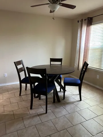 a view of a workspace with furniture