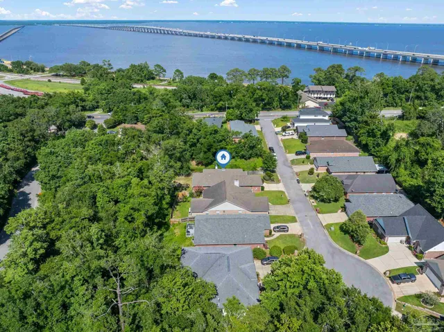 an aerial view of a house with a garden