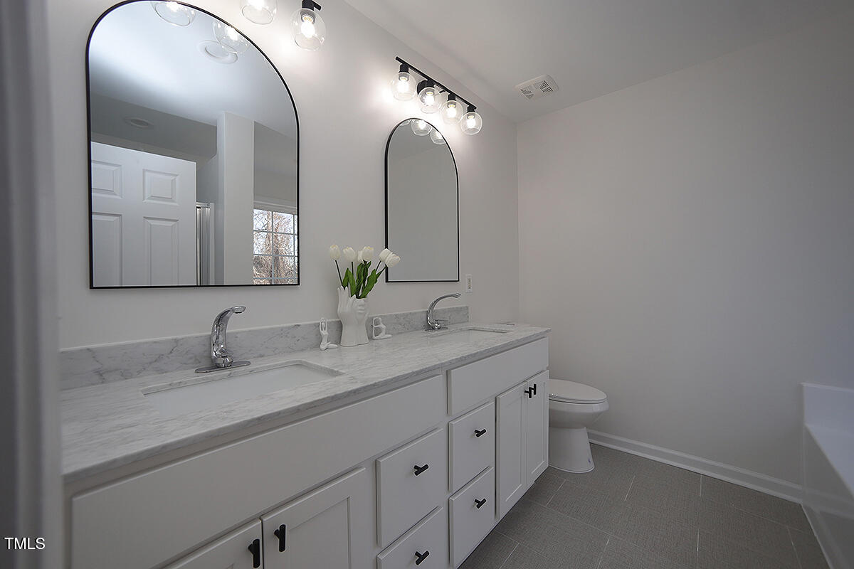 3244 Marcony Way Raleigh, NC 27610 - Photo 17 of 30 Primary Suite Spa Oasis