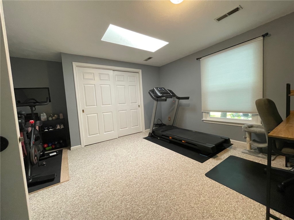 161 West Shore Road, Unit C7 Warwick, RI 02889 - Photo 27 of 36 Second bedroom with a skylight and double window.