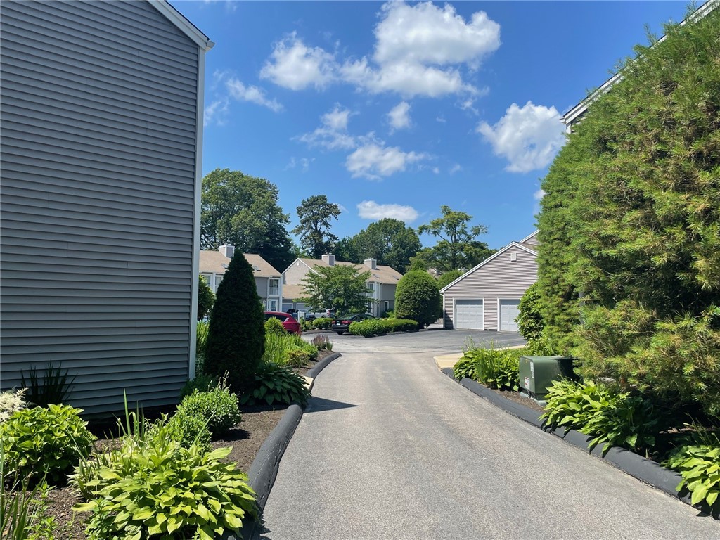 161 West Shore Road, Unit C7 Warwick, RI 02889 - Photo 4 of 36 This is the driveway out of the garage for this unit. It is way in the back of this complex.