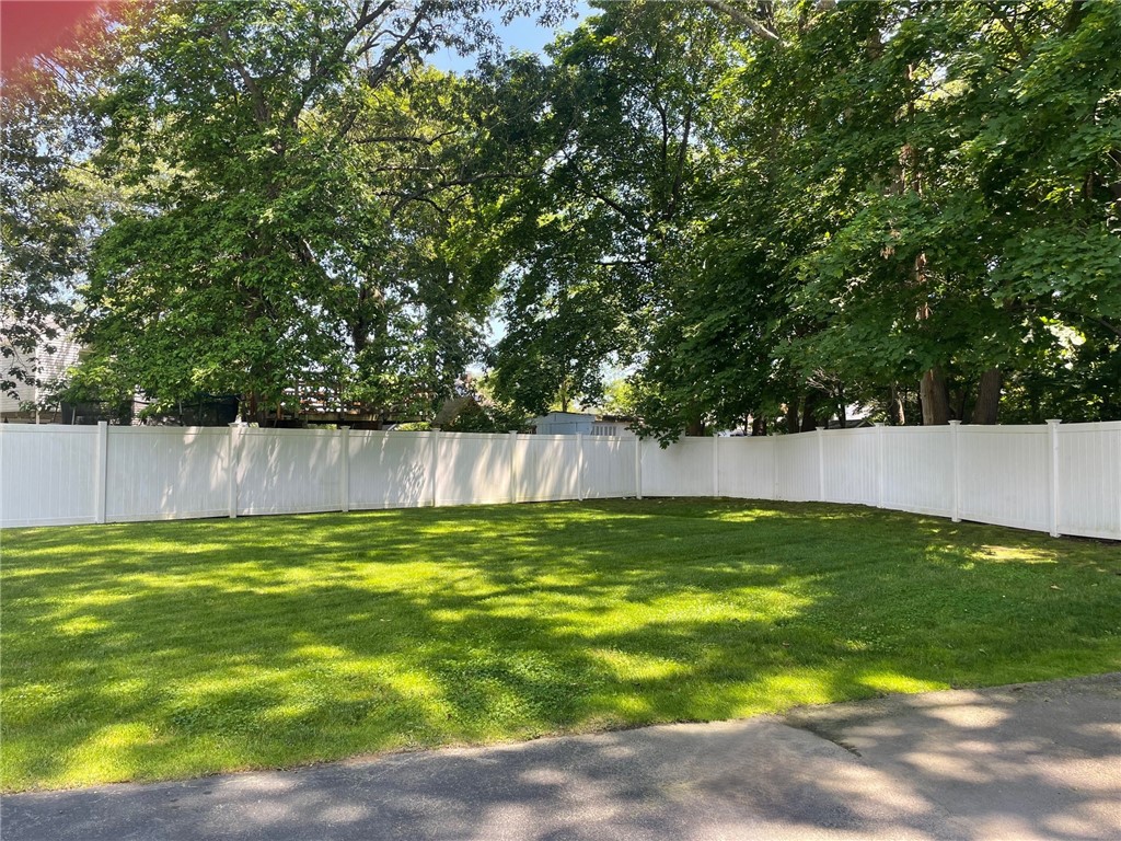 161 West Shore Road, Unit C7 Warwick, RI 02889 - Photo 6 of 36 A closer look at the large grassy area off to the side of the building.