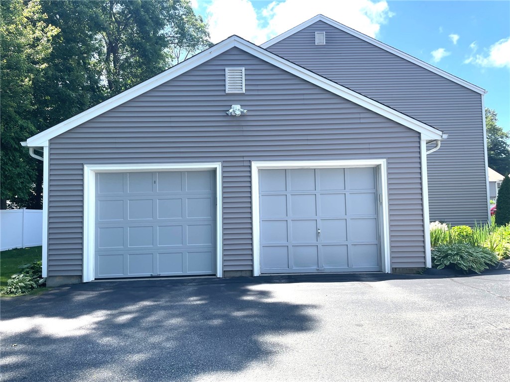 161 West Shore Road, Unit C7 Warwick, RI 02889 - Photo 8 of 36 The door to the left is the garage for unit C7. The garage is attached to the building but there is no entrance to the unit