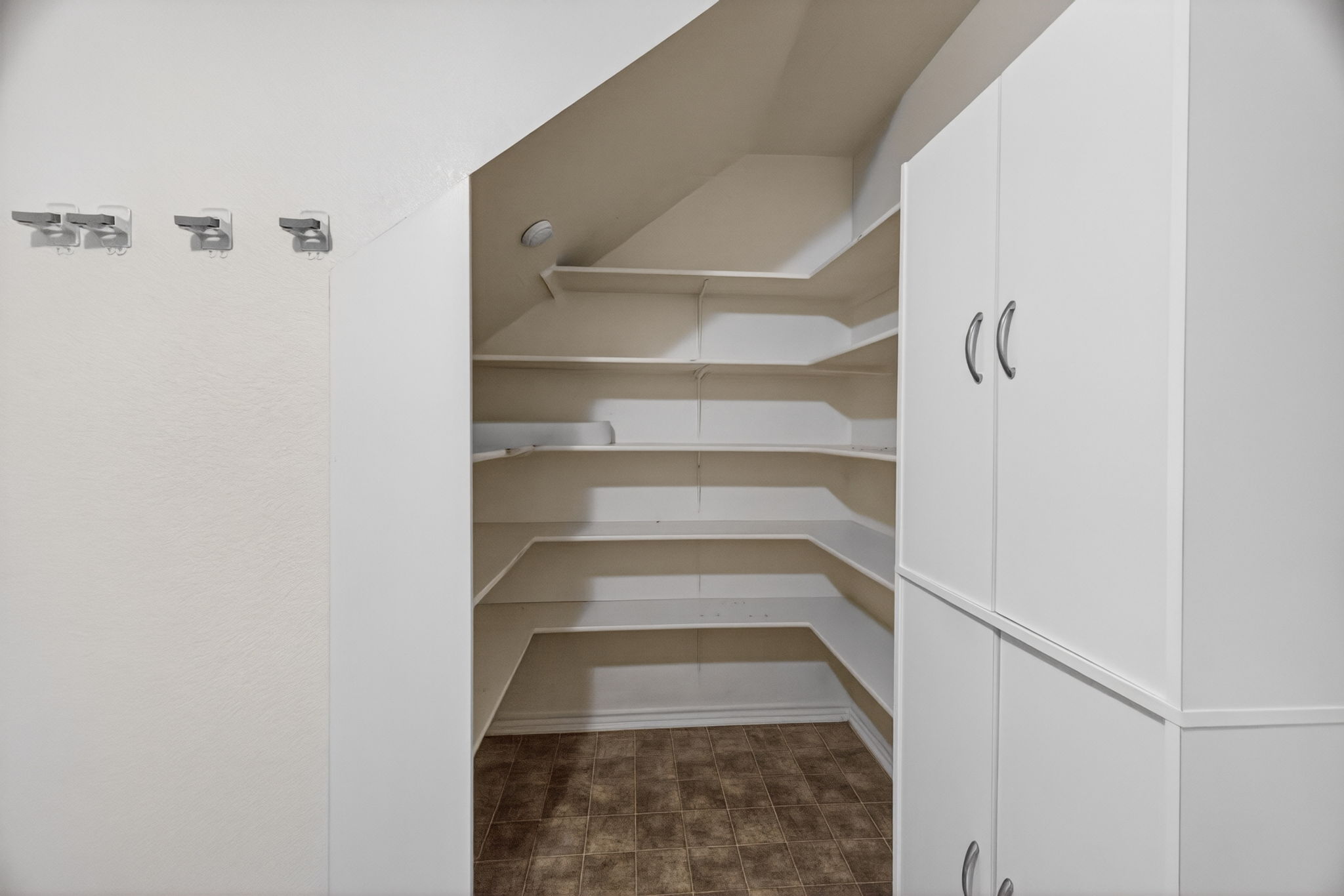 8813 Wiley Way Austin, TX 78747 - Photo 11 of 39 Pantry area set in the utility room adjacent from the main level laundry