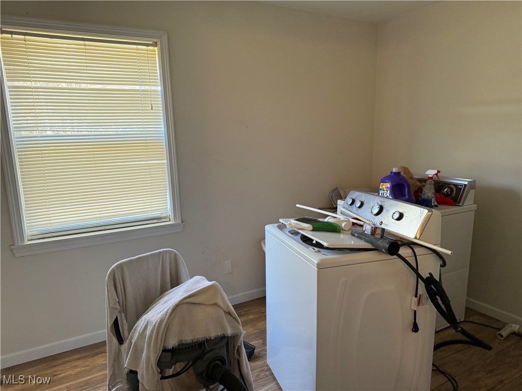 1877 Clyde Road Madison, OH 44057 - Photo 13 of 19 Washroom with washer / clothes dryer and wood finished floors