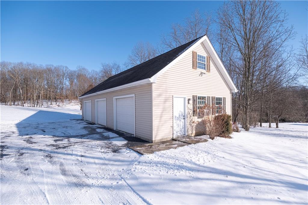 169 Howes Run Road Sarver, PA 16055 - Photo 41 of 48 3 CAR DETACHED GARAGE WITH STAIRS TO 2ND FLOOR