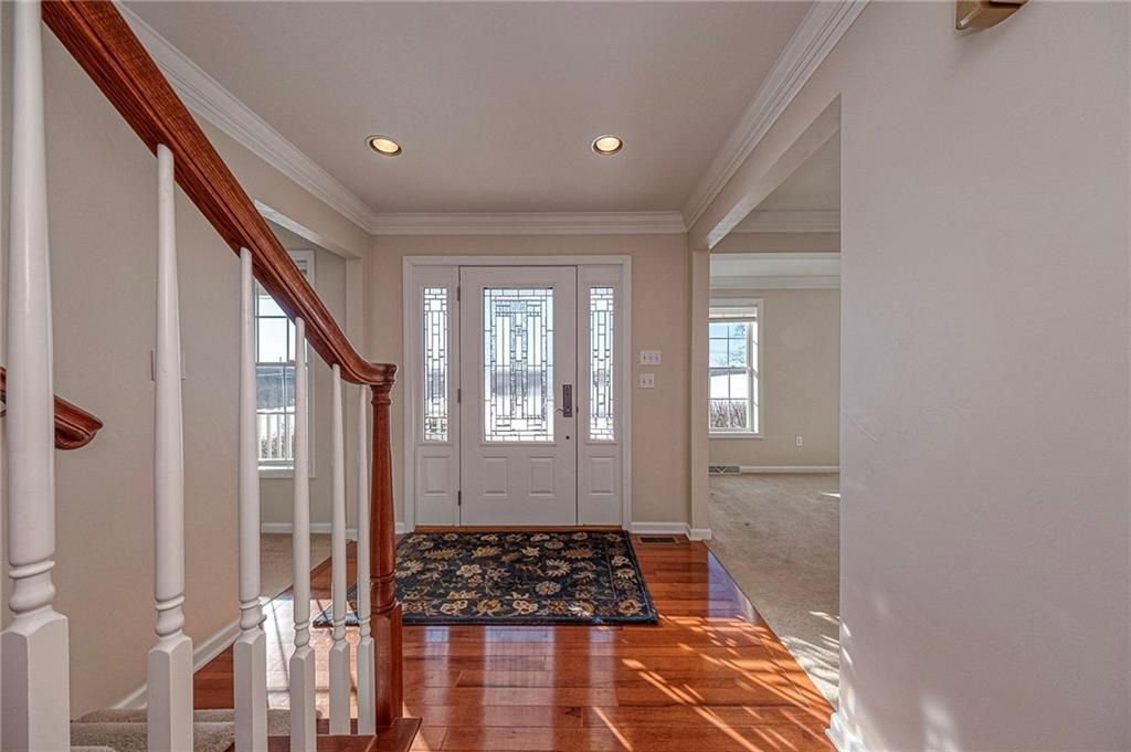 169 Howes Run Road Sarver, PA 16055 - Photo 5 of 48 Foyer showcases glistening hardwood floors and elegant front door.