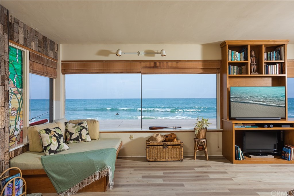 35811 Beach Road Dana Point, CA 92624 - Photo 11 of 41 a living room with furniture and a floor to ceiling window