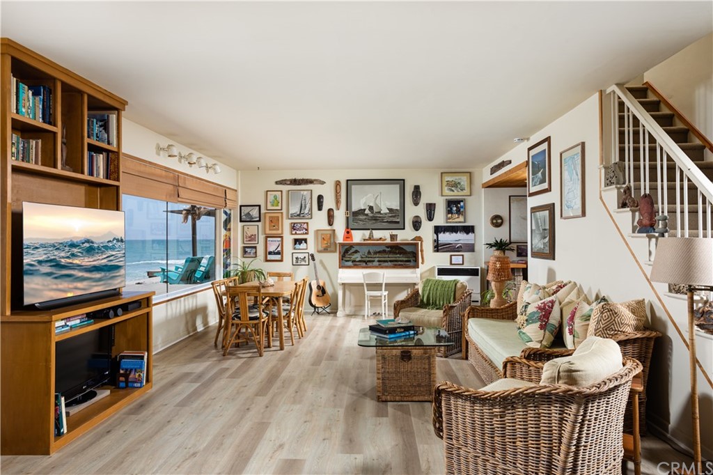 35811 Beach Road Dana Point, CA 92624 - Photo 13 of 41 a living room with furniture and a wooden floor